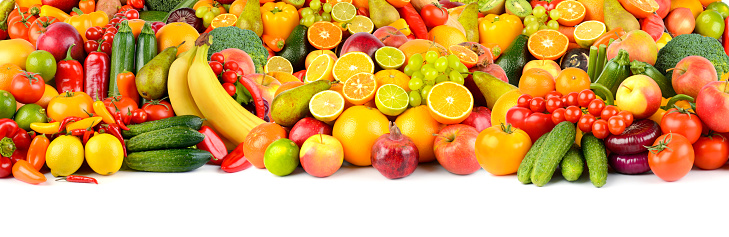 Wide collage of fresh fruits and vegetables for layout isolated on white background. Copy space