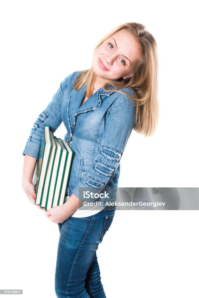 Carino piccolo Scolara con i libri di scuola - Foto stock royalty-free di Abbigliamento casual