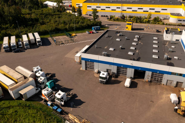 istock Drone photography of logistic warehouse and parked lorry's 1724189416