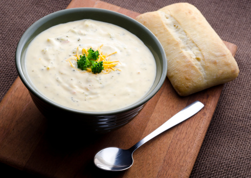 Cream of Broccoli Soup with Cheddar Cheese and Fresh Bread.