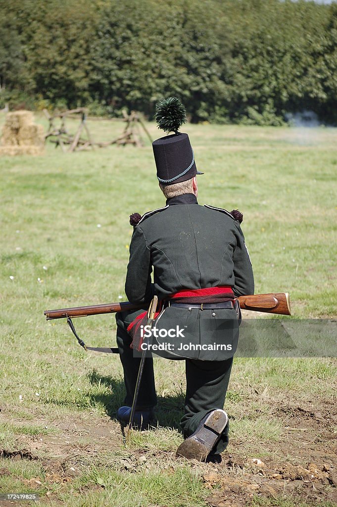 Battle weary soldier. Re-enactor of the Napoleonic era.British soldier. Battlefield Stock Photo