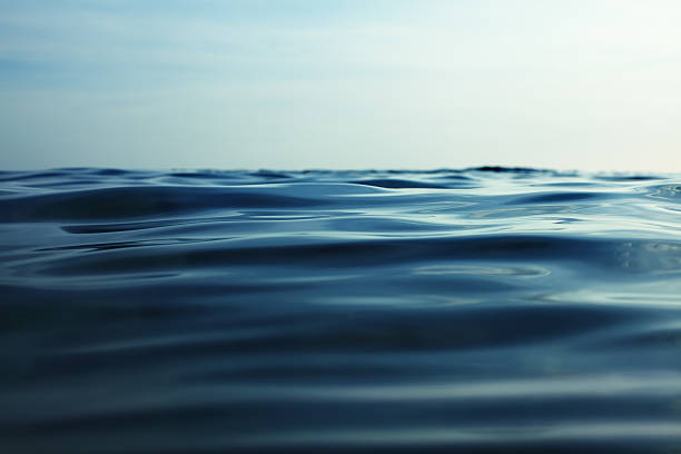 istock Surface of rolling blue water with sky in the background 172420400