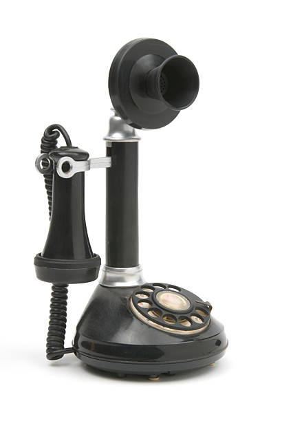 retro black candlestick phone on 255 white background.