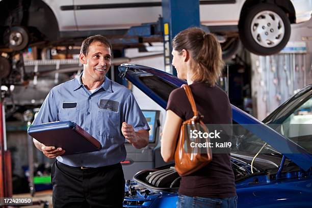 Auto Mechanic With Customer Stock Photo - Download Image Now - Customer, Mechanic, Auto Repair Shop