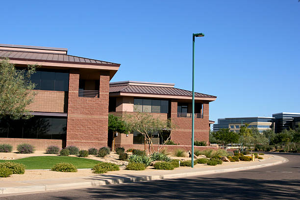 istock Modern brick office complex and landscaping and sidewalk 172421350