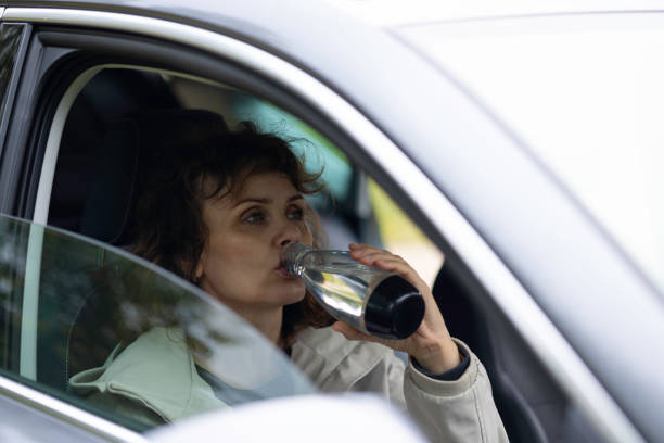 istock sustainability concepts: drinking water from a reusable bottle 1724218694