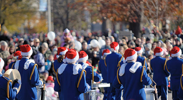 santa claus parade - marching band stock-fotos und bilder