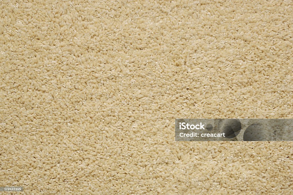 Sfondo di tappeti color crema - Foto stock royalty-free di Color crema