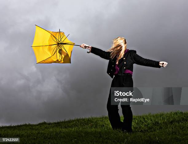 Out Of Control Blonde Gets Blown Away In Thunderstorm Stock Photo - Download Image Now