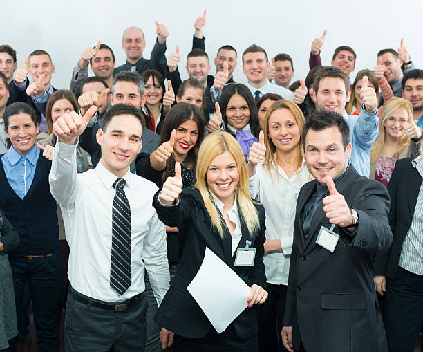 istock Business people holding their thumbs up. 172422719