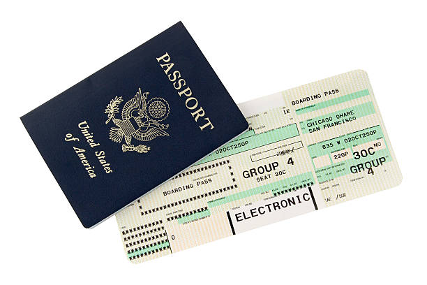 Passport and boarding pass design "Photograph of a passport with airplane boarding pass, isolated on white.Similar images:" airplane ticket photos stock pictures, royalty-free photos & images