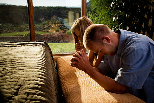 Couple Praying stock photo