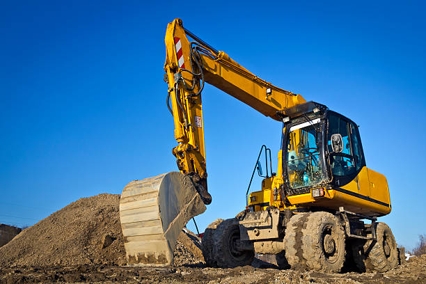 istock Yellow excavator in construction site 172424060