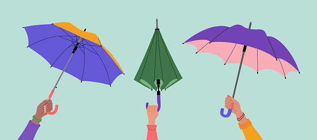Female hands holding open and closed umbrellas. Hand drawn vector illustration isolated on blue background. Flat cartoon style.