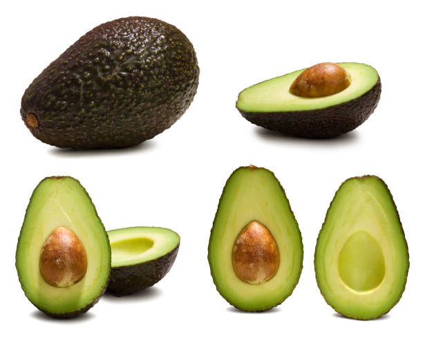 Various ways to look at an avocado a lovely collection of avocados sliced and styled various ways. clipping paths included! avocado brown stock pictures, royalty-free photos & images