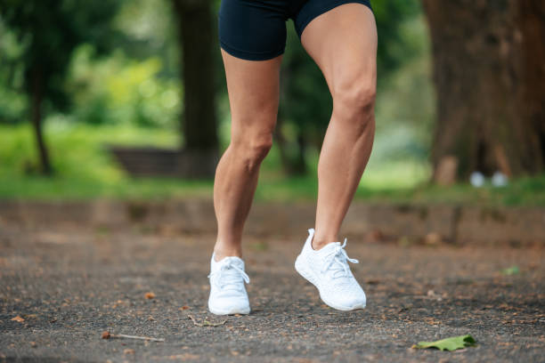 istock Unrecognizable slim athletic woman running on road. 1724241676