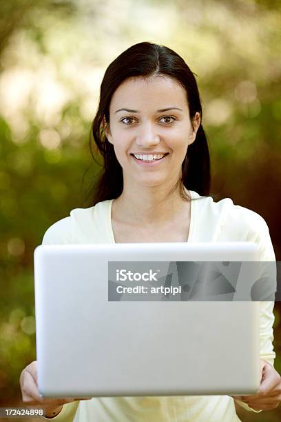 Young Woman Working On Laptop Stock Photo - Download Image Now - 20-29 Years, Adolescence, Adult