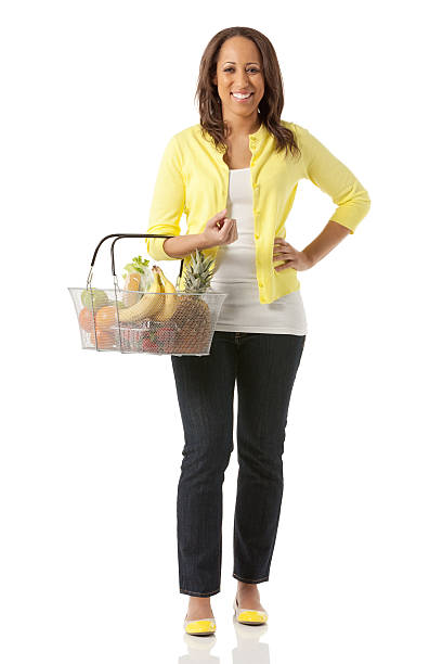 istock Happy young woman with fruit basket 172424993