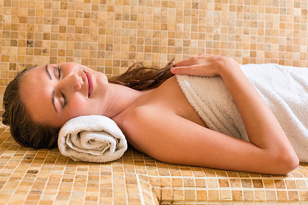 istock Woman relaxing in steam sauna 172425351