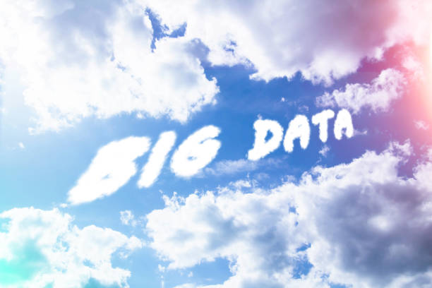 Big date inscription in sky with clouds in bright rays of sun..