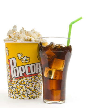 popcorn in container, and soda in a clear glass with ice cubes and green straw.http://www.garyalvis.com/images/foodDrink.jpg
