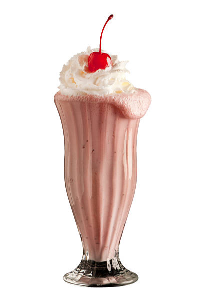 istock A strawberry milkshake in a tall glass with whipped cream 172425527