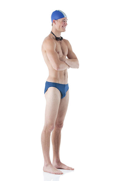 homem natação em pé com os braços cruzados - swimming male isolated swimming goggles imagens e fotografias de stock