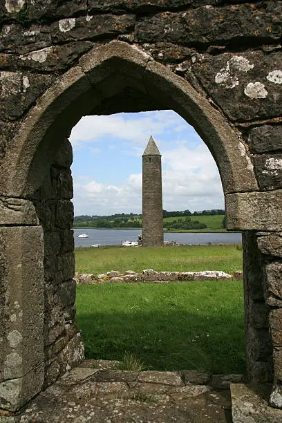 "The roundtower of Devenish island in Lower Lough Erne, north of Enniskillen, County Fermanagh in Northern Ireland. One of the finest monastic sites in Northern Ireland."