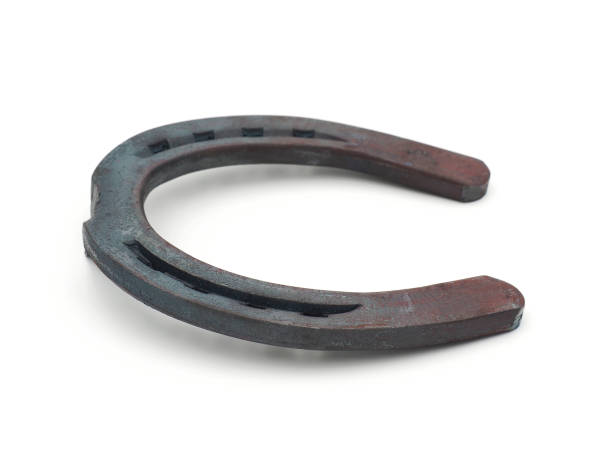 istock Lucky metal horseshoe isolated on white background 1724257991