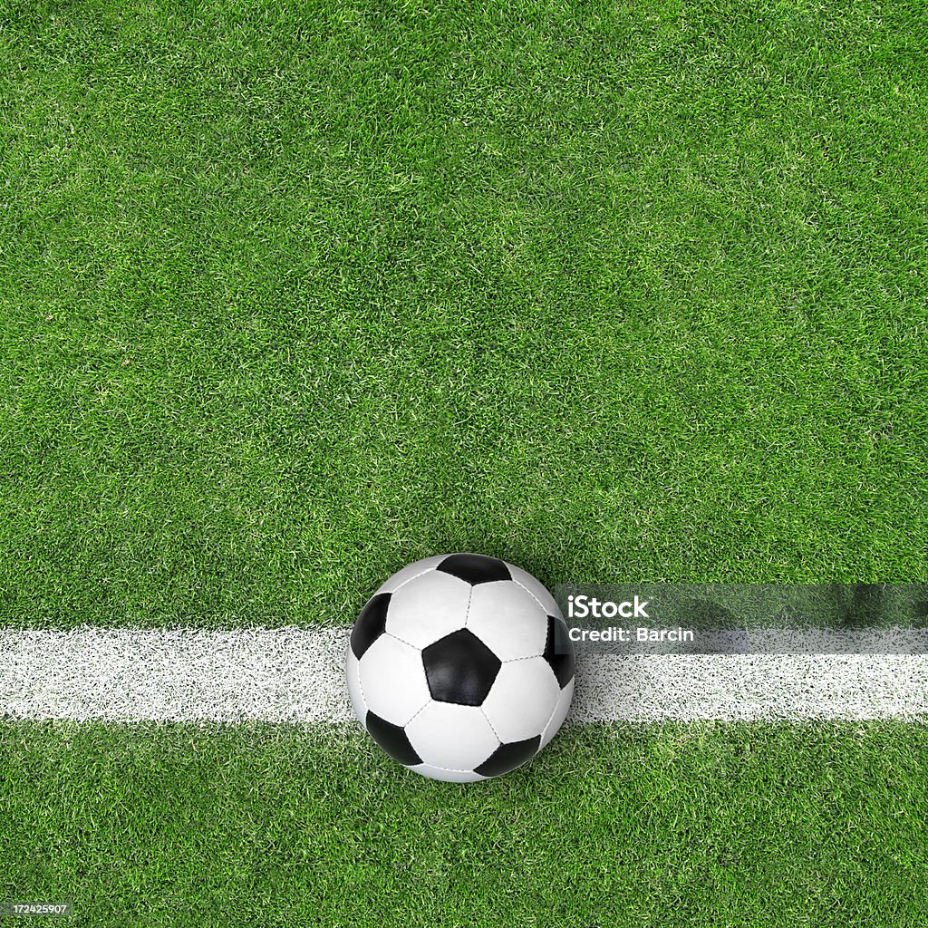 Soccer ball on green grass Soccer ball on green grass. Top view. High Angle View Stock Photo