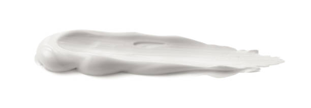 istock White smear and texture made byface clay or cream isolated on white background. 1724262327