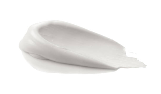 istock White smear and texture made byface clay or cream isolated on white background. 1724262329