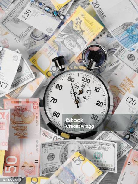 Dólares Euros Y Libras Con Un Cronómetro Foto de stock y más banco de imágenes de Ahorros - Ahorros, Billete de banco, Billete de banco de cincuenta euros