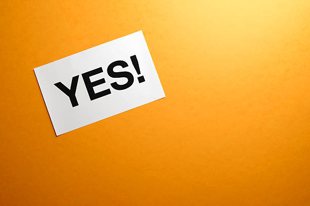 Yes sign on paper "Yes sign on paper, Colour Background" yes single word stock pictures, royalty-free photos & images