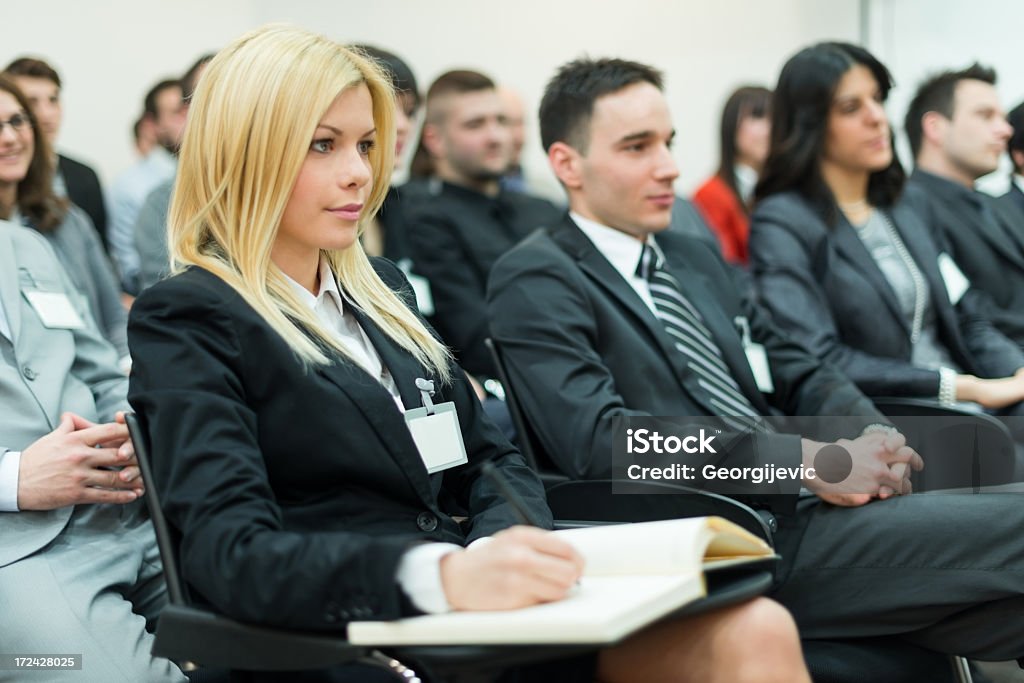 Groupe d'affaires au séminaire, écrire un cours - Photo de Affaires libre de droits