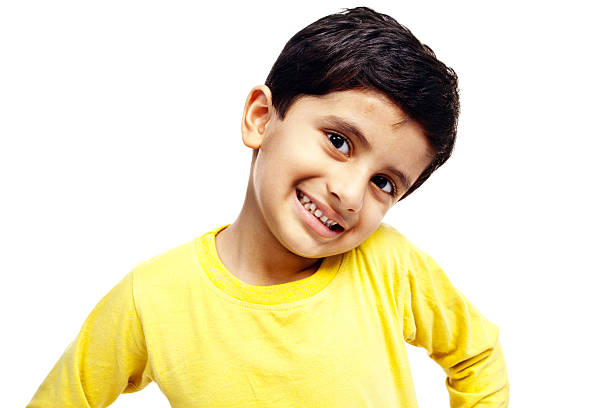 radosny indyjski chłopiec dziecko na białym tle - fashion male beauty confidence elegance zdjęcia i obrazy z banku zdjęć