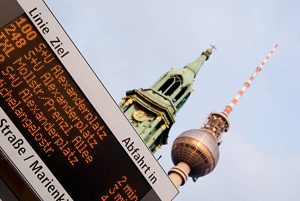Winter Blue Sky Morning Old City Square Christmas Tree Decoration and a Clock and the Street Sign with Surrounding Modern Business Buildings