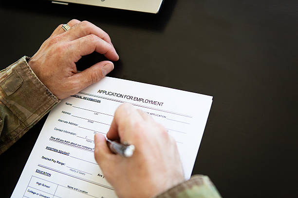 istock Soldier filling out job application form 172428650