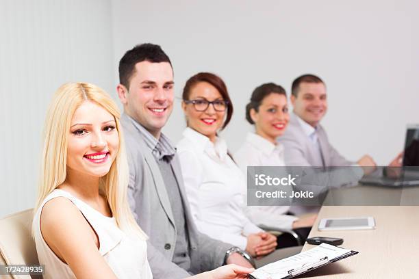 Group Of Businesspeople Having A Meeting Stock Photo - Download Image Now - Group Of People, In A Row, Office