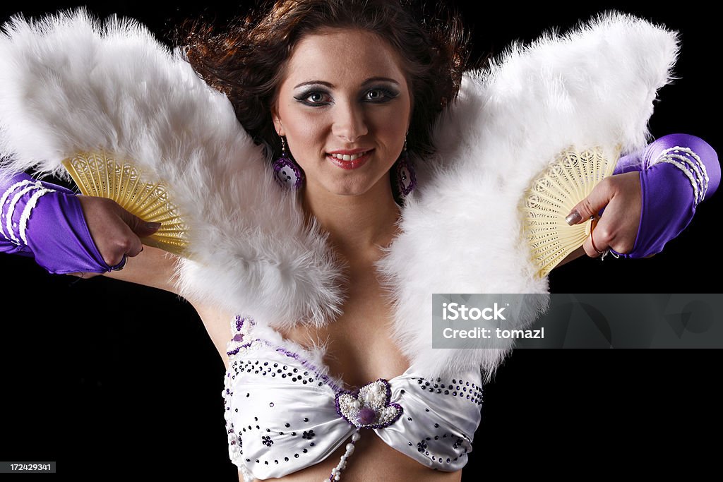 Belly dancer portrait Young female performer on black background. Adult Stock Photo