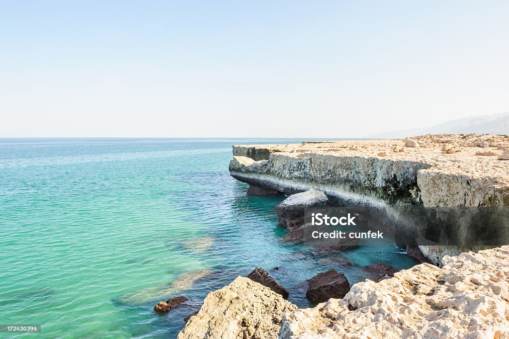 Rocky cliffs near Tiwi Cliffs near Tiwi, Oman.  North Stock Photo