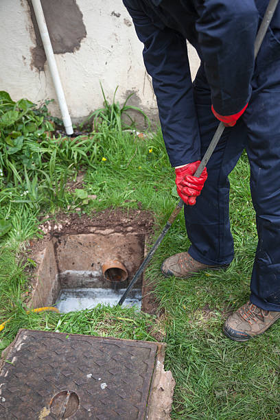 istock Water service worker stopping a leak on a valve box 172431192