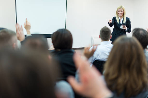 istock Young businesswoman with microphone 172431708