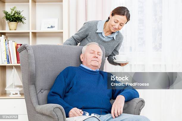 Senior Man Resting In Chair Stock Photo - Download Image Now - Daughter, Father, Napping