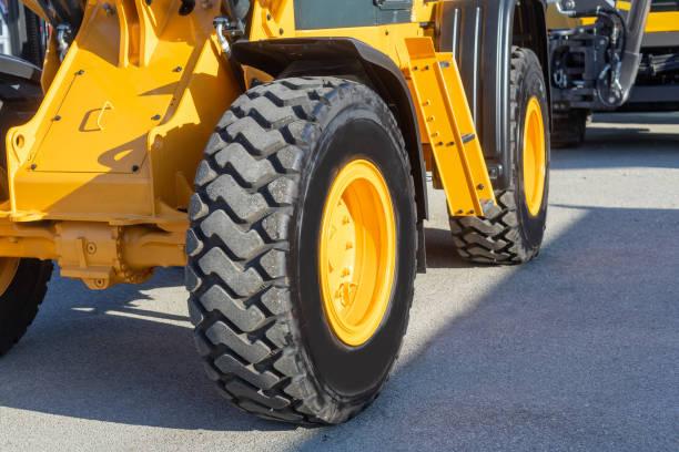 closeup of a wheel of earth moving machine stock photo