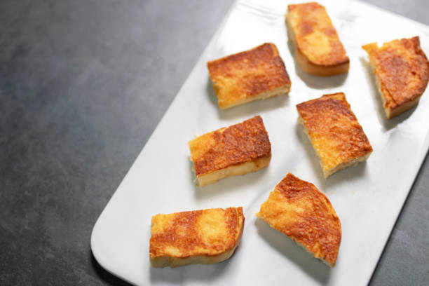 istock Sizzler bread crispy cheese bread. Sprinkle parmesan cheese grilled on the pan, a little crispy, juicy, heavy butter, full of cheese. 1724327572