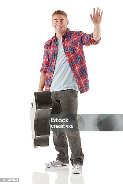 Happy Young Man With Guitar Case Stock Photo - Download Image Now - 20-29 Years, Acoustic Guitar, Adult