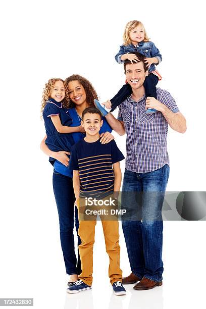 Mixed Race Family Of Five Smiling Together On White Stock Photo - Download Image Now