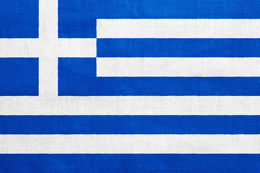 Flag of Greece on a textured background. Concept collage.
