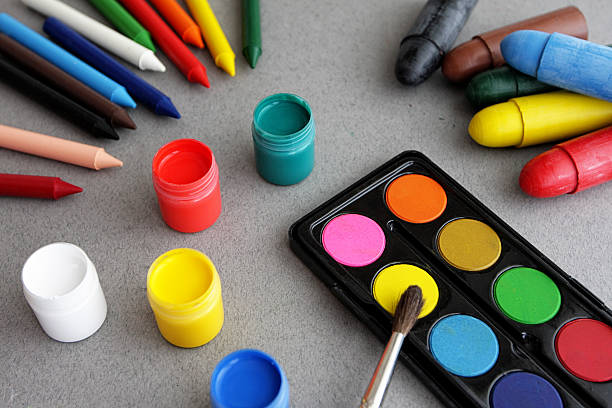 istock Tempera, water-colour, crayons and brushes on grey background 172433664